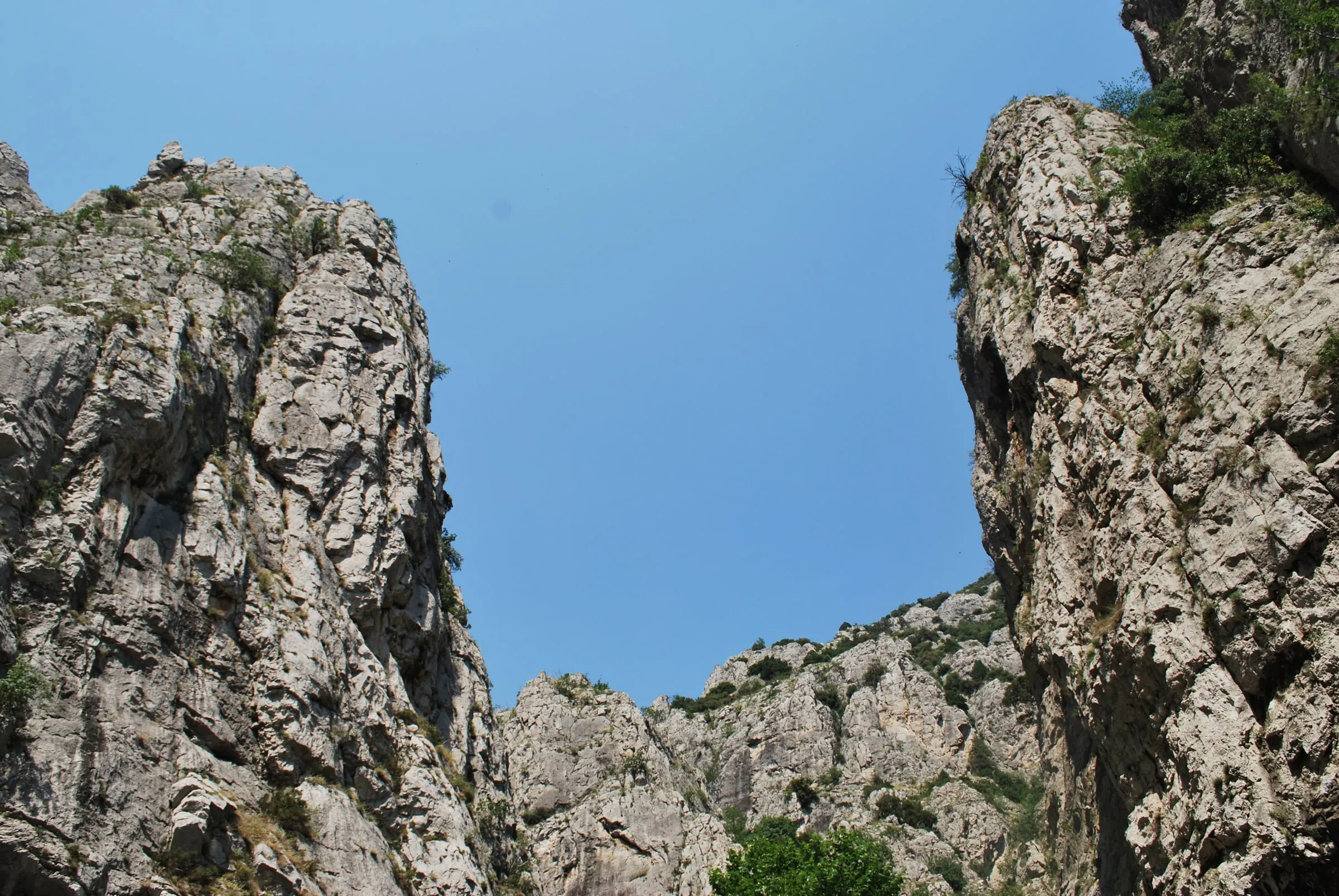 Limestone spires of the Demir Kapija gorge against a clear sky